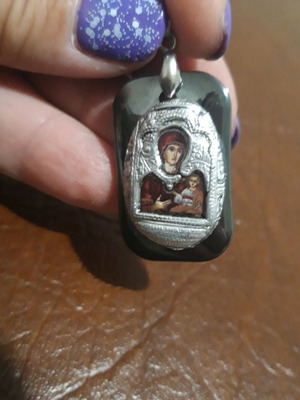 Pendant like new with religious motifs on rectangular hematite
