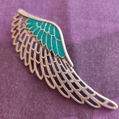 Feather brooch new with turquoise enamel and silver details