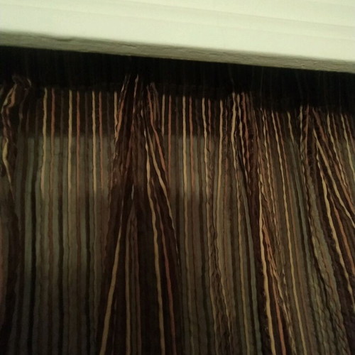 Curtain for window in dark brown shades with beige stripes like new