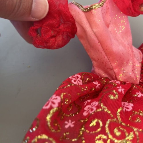 Barbie dress used, sleeve defect needs repair