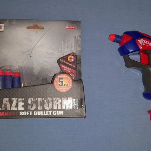 Blaze Storm gun like new, manual with 5 soft foam darts