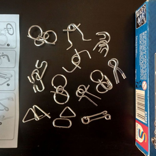 Metal Magic Schmidt metal puzzle set of 12 used