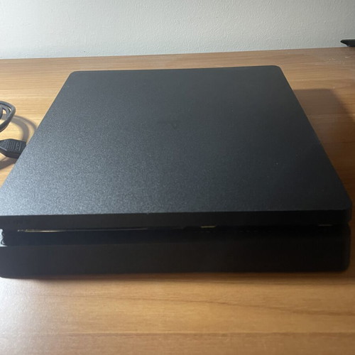 PlayStation 4 console with 2 controllers, NBA 2K25, FIFA 20, Minecraft