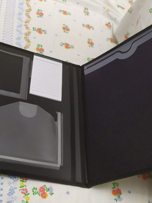 Black plastic folder, like new