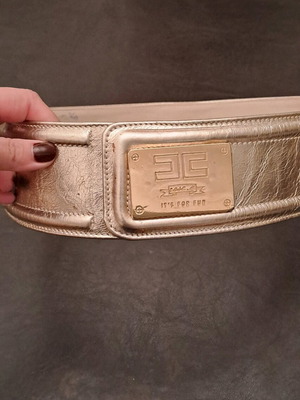 Gold belt used with two buckle positions, size 85