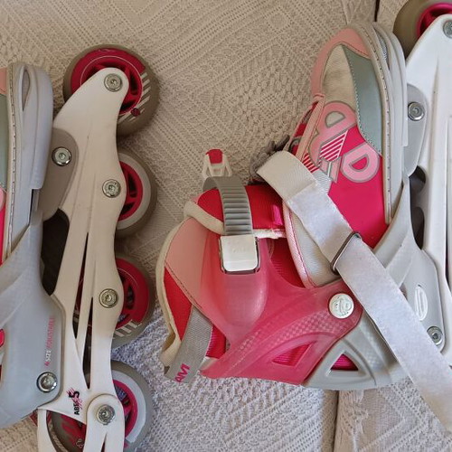 Roller skates used, size 33-36 with helmet and protective gear