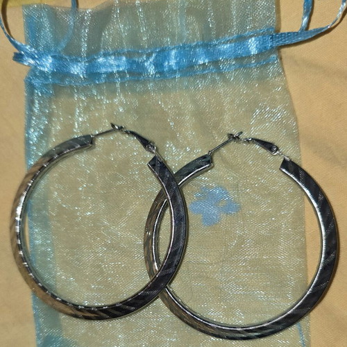 Hoop earrings like new, grey color, unknown material