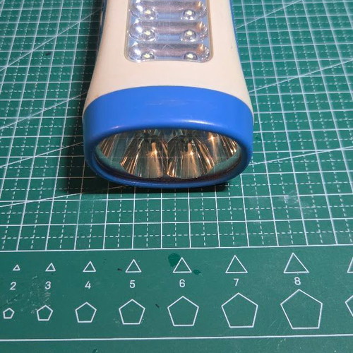 Rechargeable flashlight BT-3202 like new with FM radio and 15 LED