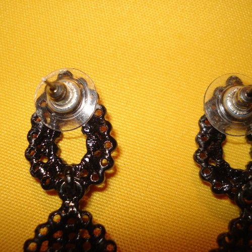 Vintage earrings dangle like new