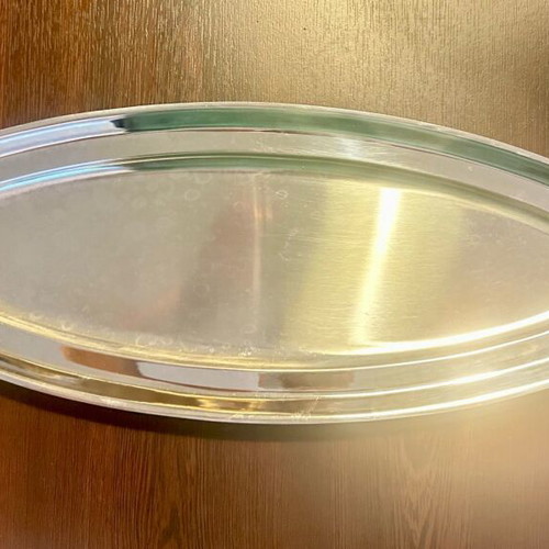 Oval stainless steel serving platter fish-shaped with gold details like new