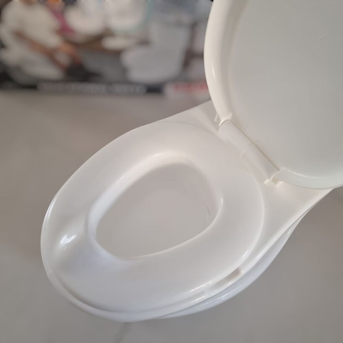 Educational potty like new with flushing tank