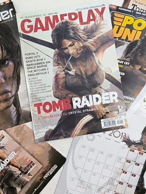 Game materials and posters used for Tomb Raider, Shadowman, The Simpsons