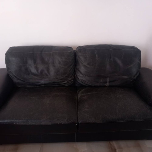 Two-seater leather sofa, medium condition