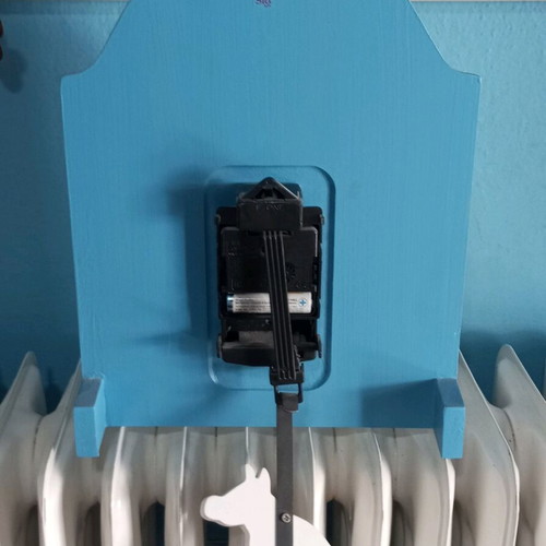 Blue wall clock used for kids room with pirate and dog design