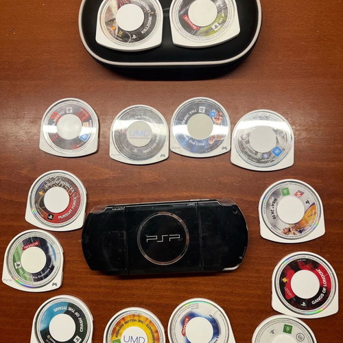 Sony PSP used for parts with 10 games and carrying case