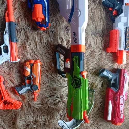 Nerf set of 4, 3 in perfect condition, red mega slightly broken