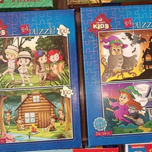 Children's puzzles and board games used, ages 4 to 8
