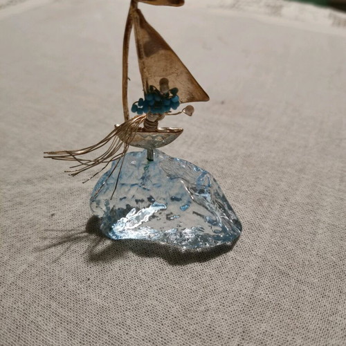 Table lucky charm like new with sailboat figurine