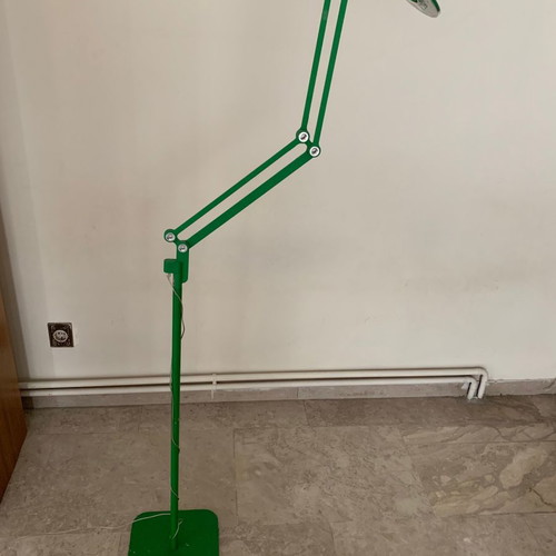 Modern floor lamp used with rotating arm and LED lighting
