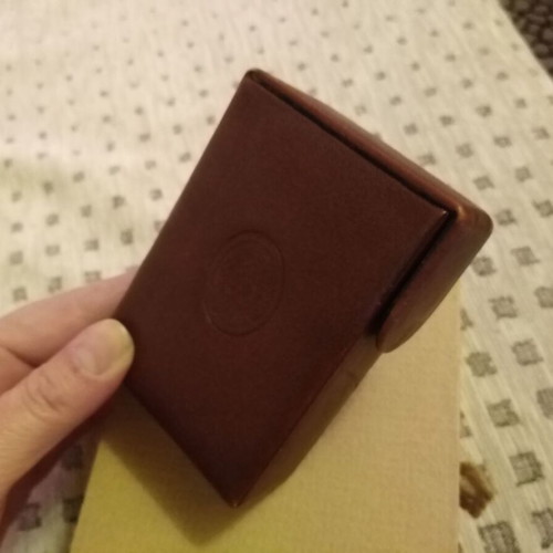 Cigarette pack case used, brown