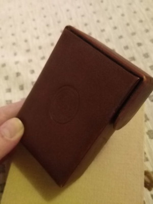 Cigarette pack case used, brown