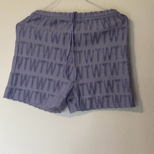 Blue shorts with letter textures like new