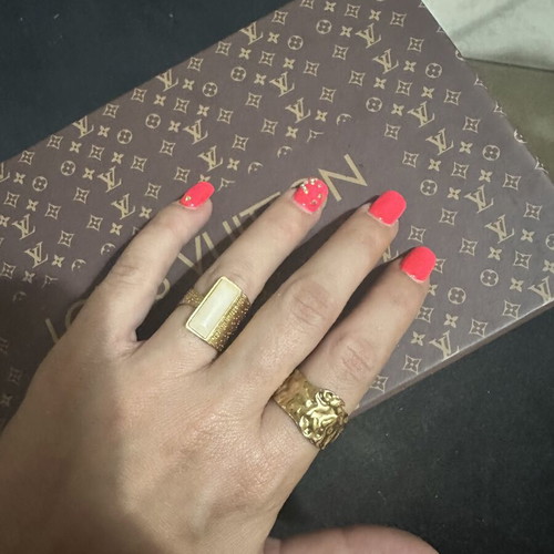 Steel rings like new, gold tone, set of two