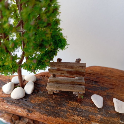 Handmade sea-themed driftwood diorama with Greek island house