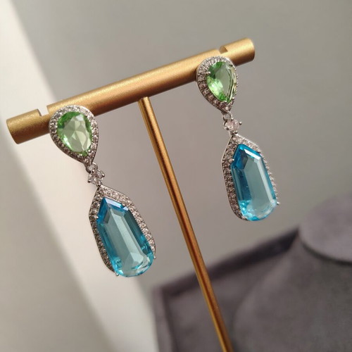 Platinum plated earrings with zircon stones like new