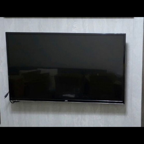 JVC 32-inch TV used with Netflix and YouTube apps