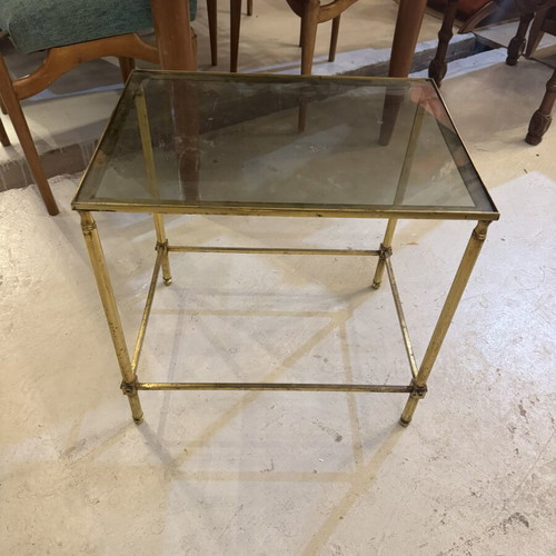 Midcentury metal coffee table with glass base used