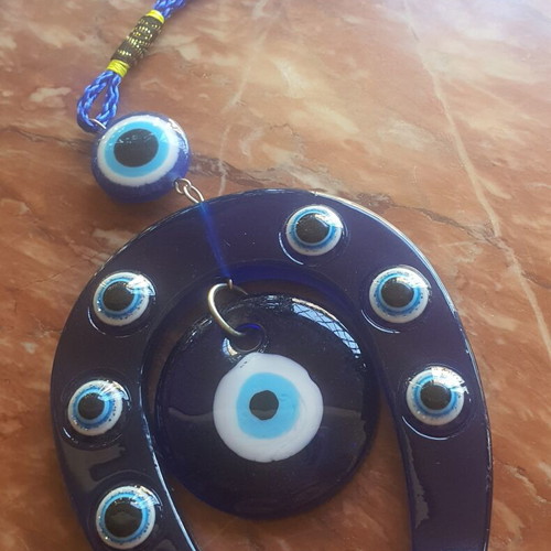Gouri horseshoe with evil eye charm