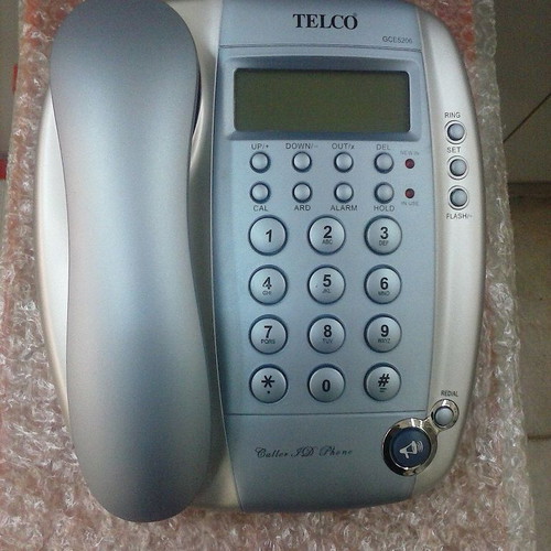 Wired telephone with caller ID, silver and blue
