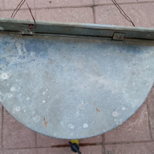 Vintage galvanized water storage with plastic tap used