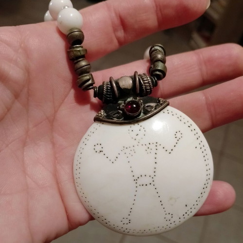Handmade necklace with white pearls and bone charm used