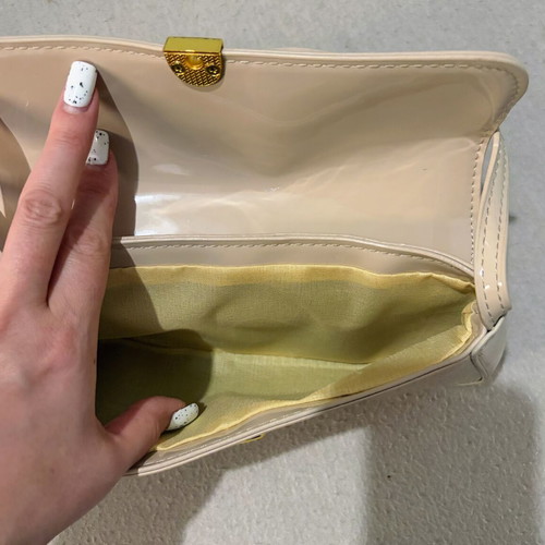 Small shoulder bag like new, beige with metal clip