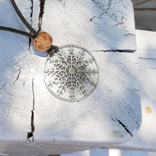 Women's silver snowflake pendant long