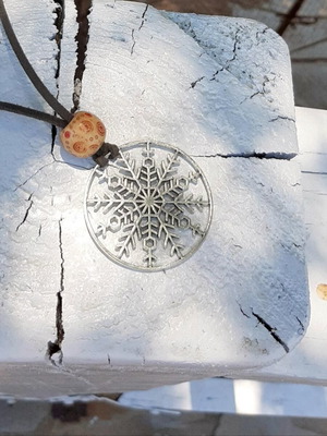 Women's silver snowflake pendant long