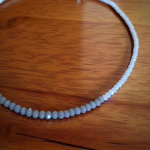 Handmade necklace with white and gray crystal beads