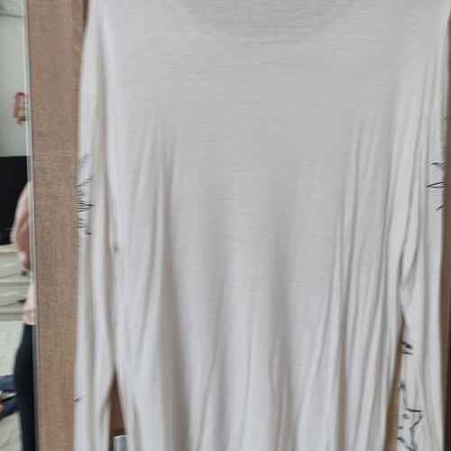 Boohoo white blouse used with sun and moon graphics on sleeves
