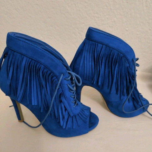 Blue high-heeled boots with fringes like new