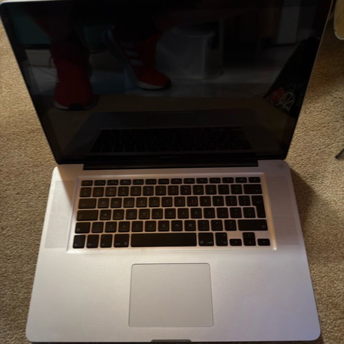 MacBook Pro A1286 used for parts without disk, memory, or charger