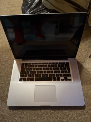 MacBook Pro A1286 used for parts without disk, memory, or charger