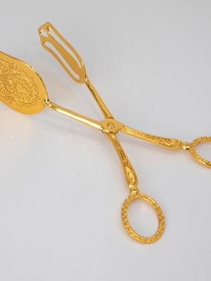 Silver-plated tongs new, gold color