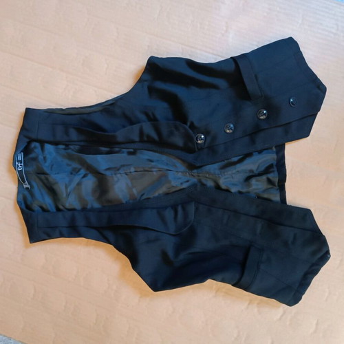 Women's trf vest black like new, size L