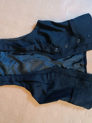 Women's trf vest black like new, size L