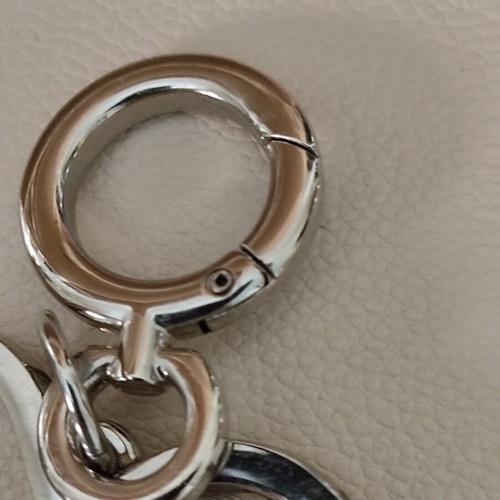 Burberry silver heart bag charm like new