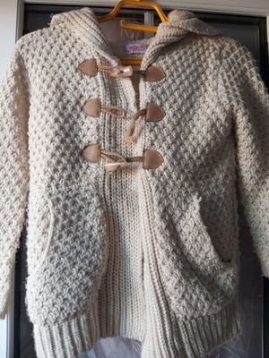 Coat size 8 used with minor wear on pocket