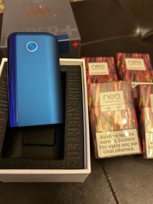 Glo tobacco heating device new with 4 sealed packs