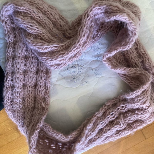Women's knitted pink neck scarf used